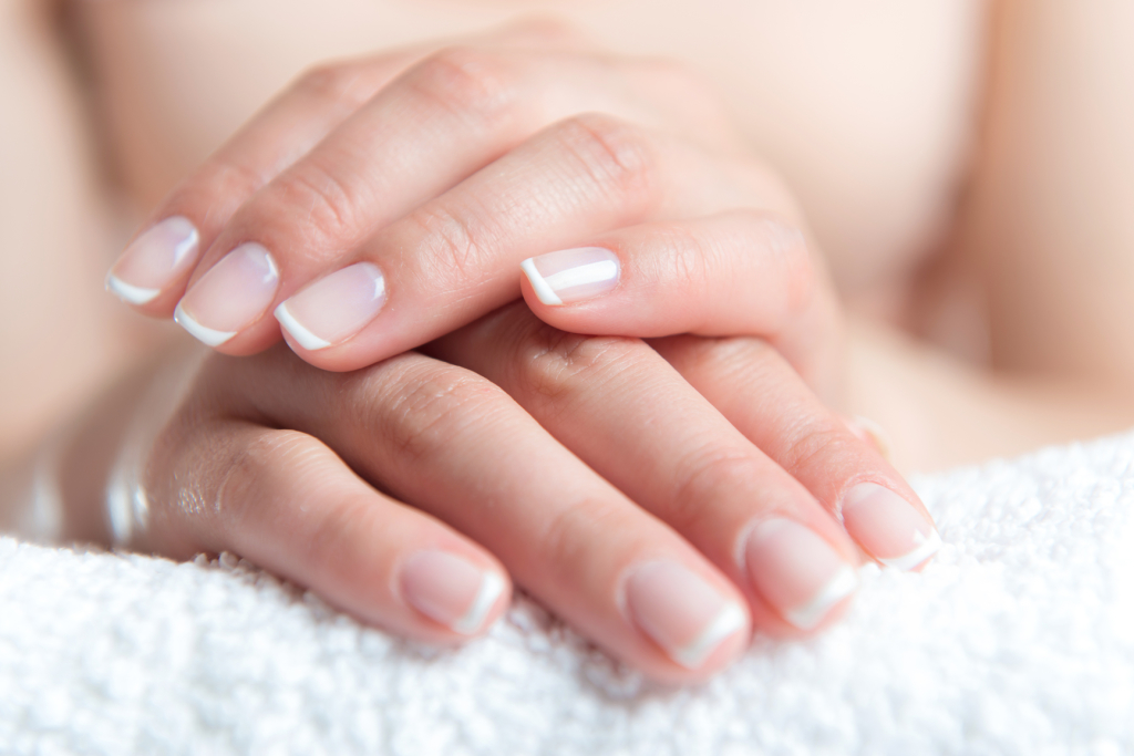 Beautiful hand with perfect nail french manicure