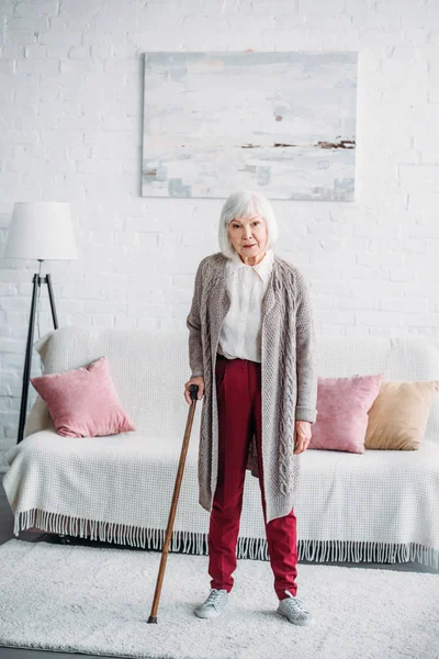 Grey Hair Lady Wooden Walking Stick Standing Middle Room Home — стоковое фото
